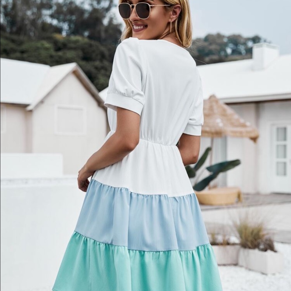 Very nice cut and sew pull dress, ruffle hem dress.